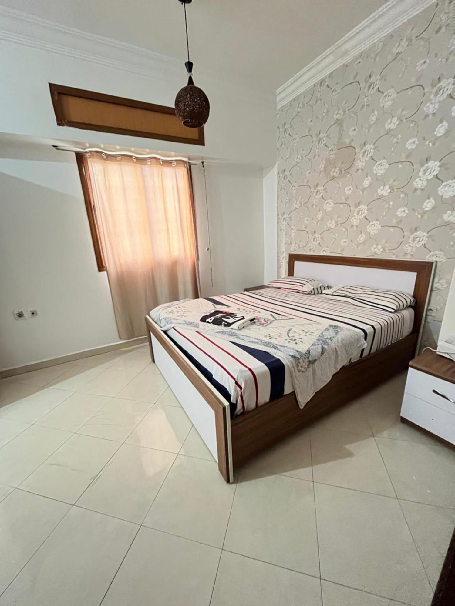 Eris Plage Tanger Playa Gare Du Train Apartment Bagian luar foto