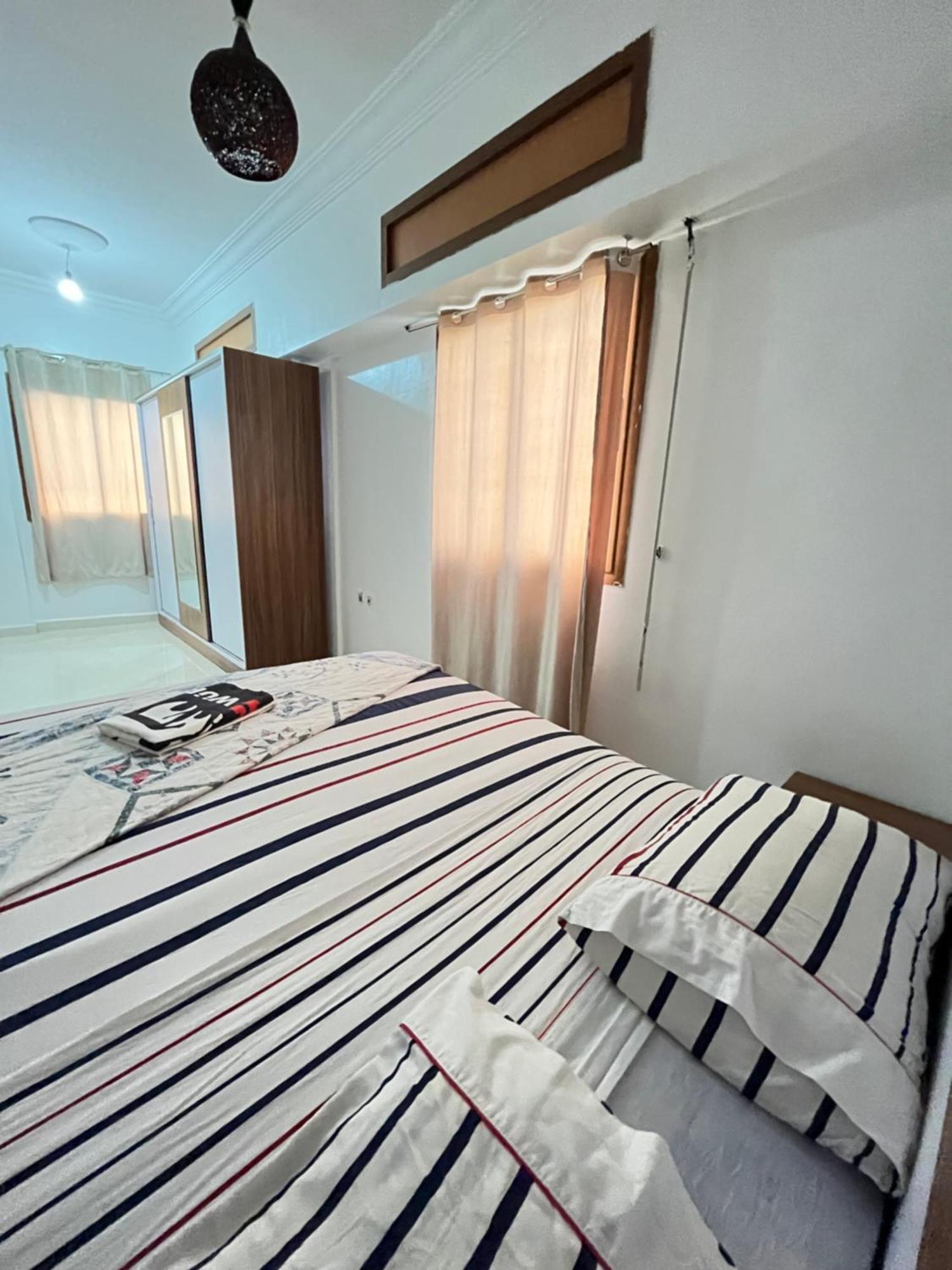 Eris Plage Tanger Playa Gare Du Train Apartment Bagian luar foto